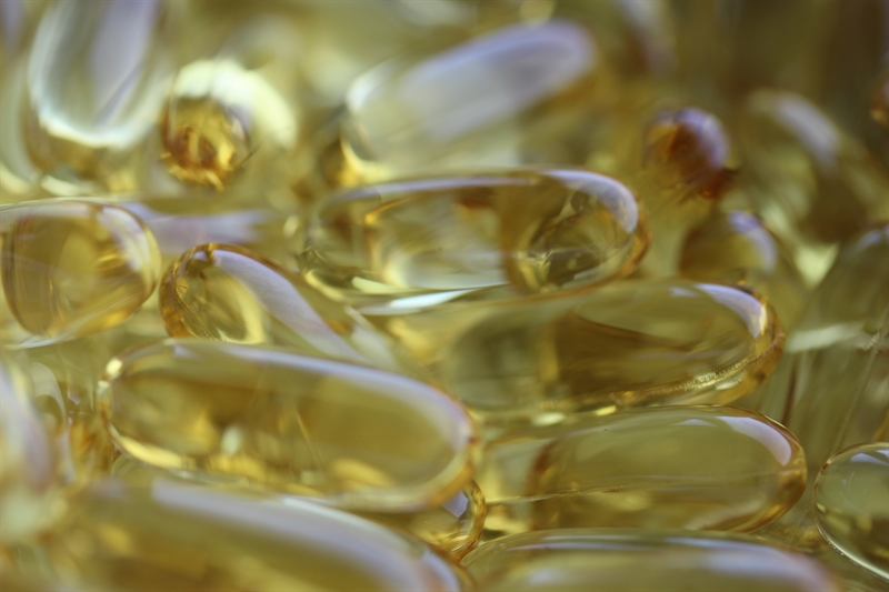 Yellow oblong softgel